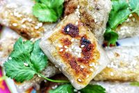 Crispy Rice Paper Dumplings with Savory Filling and Dipping Sauce