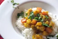 Cumin-Scented Potatoes with Tomatoes (Ghurma Aloo)
