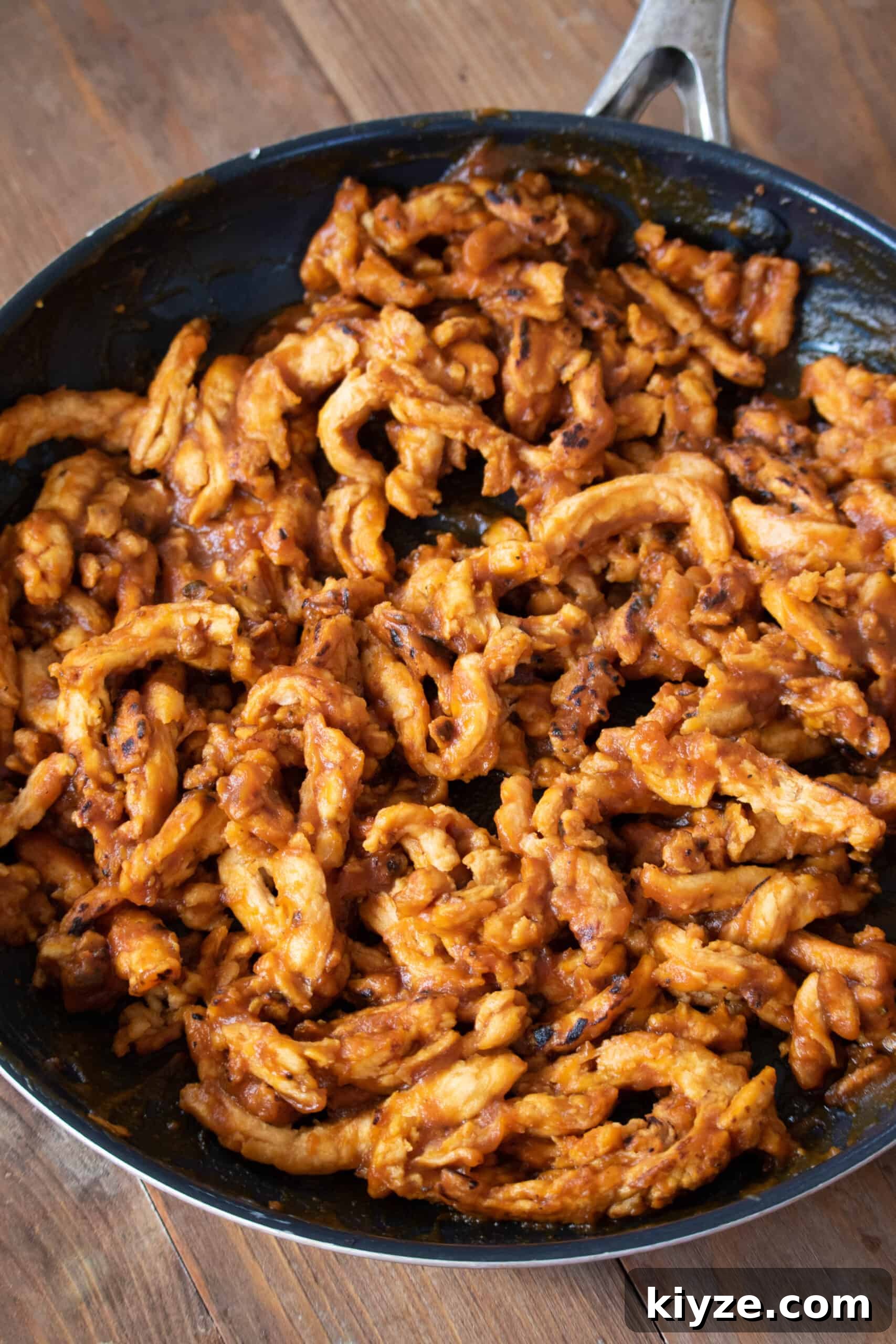 Autumn Vegan BBQ Sandwiches for Cozy Fall Gatherings 3 Soy curls browning in skillet
