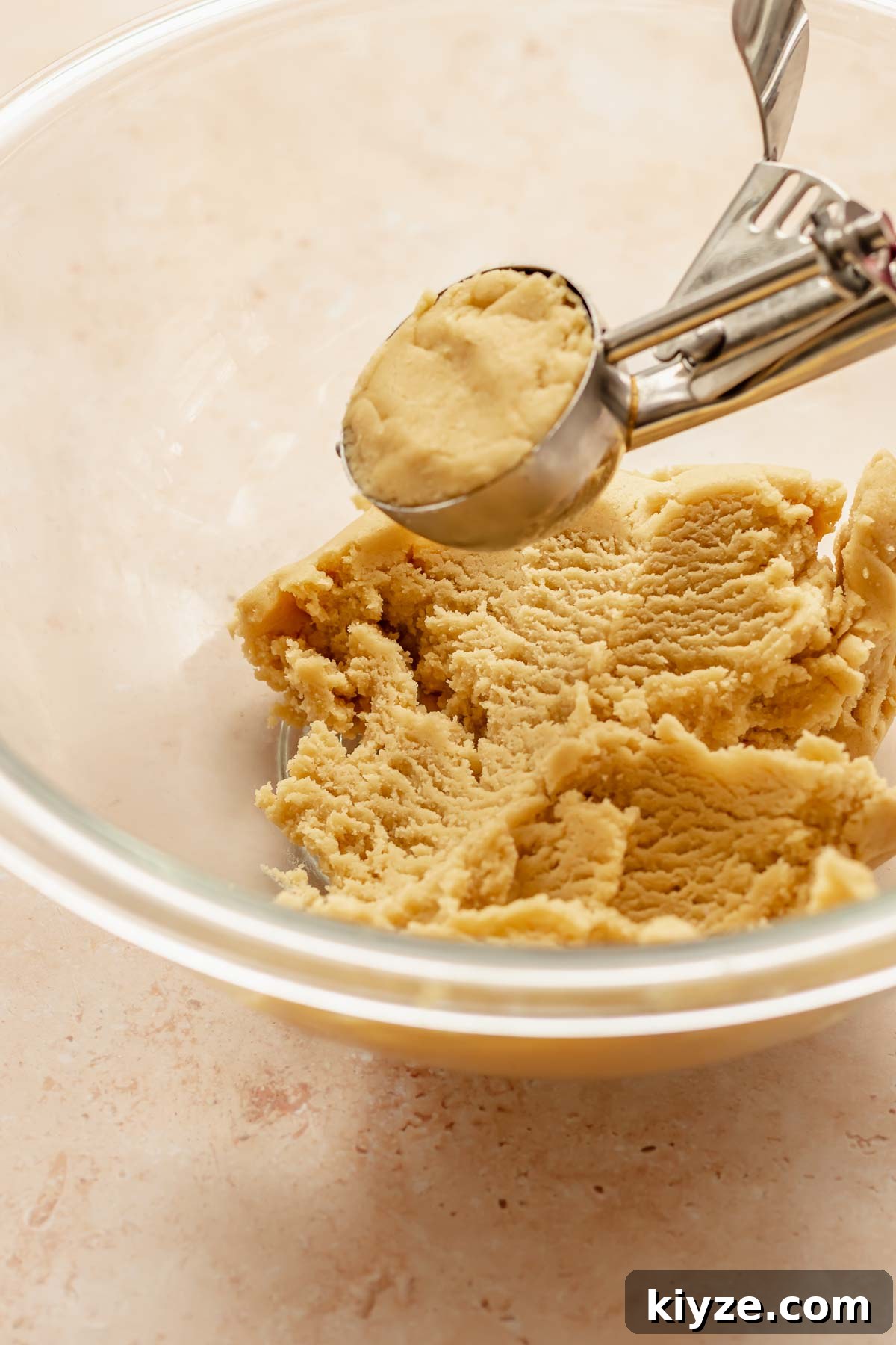Cinnamon Swirl Coffee Cake Cookies: Soft Baked Recipe 11 Cookie dough flush in a cookie scoop.