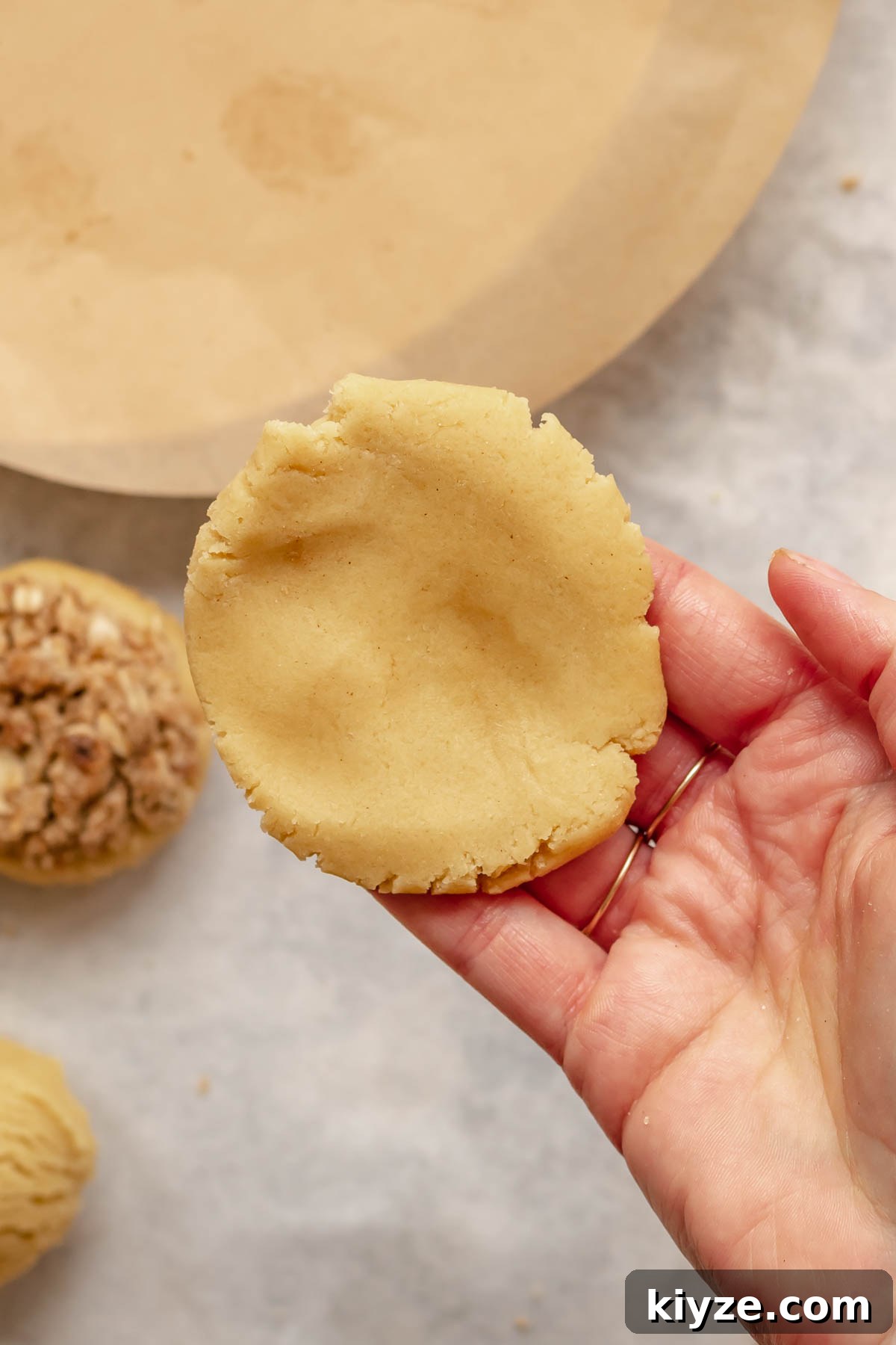 Cinnamon Swirl Coffee Cake Cookies: Soft Baked Recipe 12 Cookie dough flattened into a disc.
