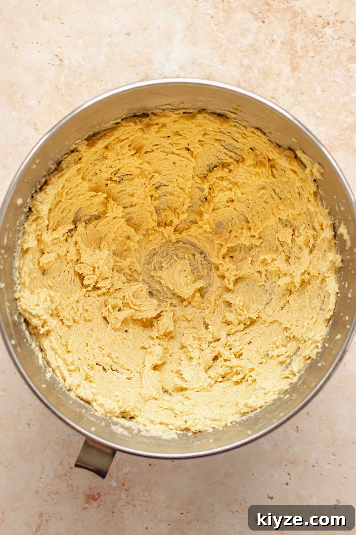 Cinnamon Swirl Coffee Cake Cookies: Soft Baked Recipe 9 Eggs whipped into butter and sugar in a bowl.