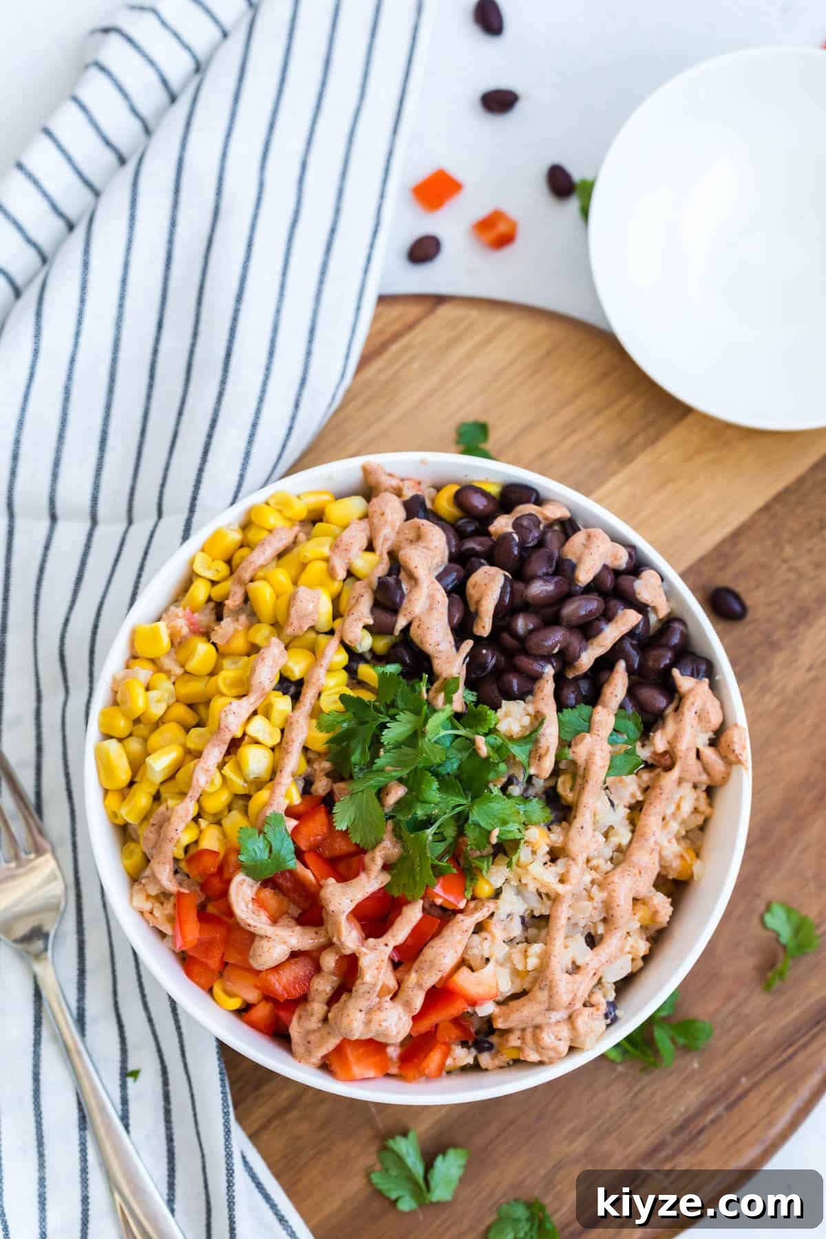 Cauliflower Rice Enchilada Bowl with Shredded Chicken & Salsa Verde 2 Cauliflower rice enchilada bowl with all the fixings.
