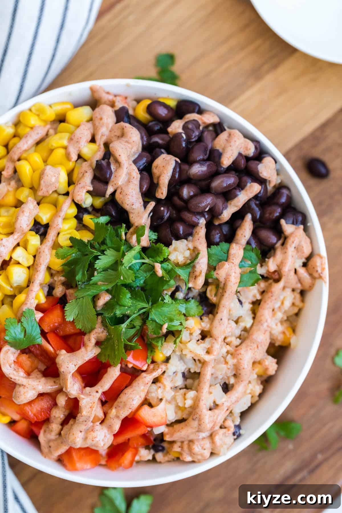 Cauliflower Rice Enchilada Bowl with Shredded Chicken & Salsa Verde 3 A bowl of cauliflower rice enchilada bowl.