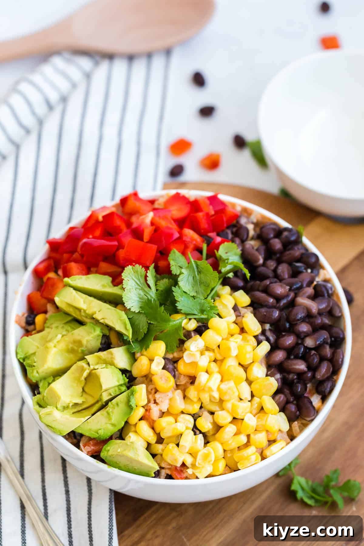 Cauliflower Rice Enchilada Bowl with Shredded Chicken & Salsa Verde 4 Cauliflower rice enchilada bowl with all the toppings in the bowl.