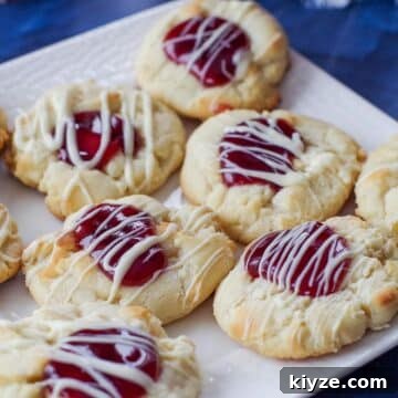 white chocolate raspberry cookies on a white plate