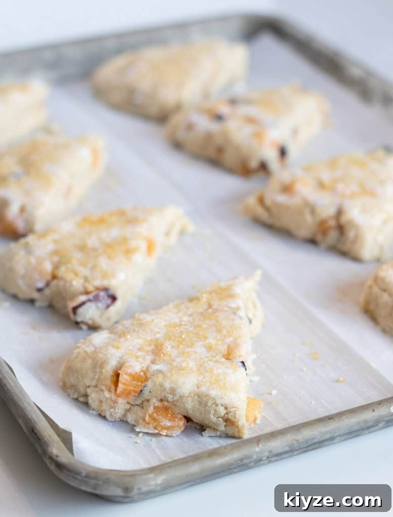 unbaked scones on a baking sheet