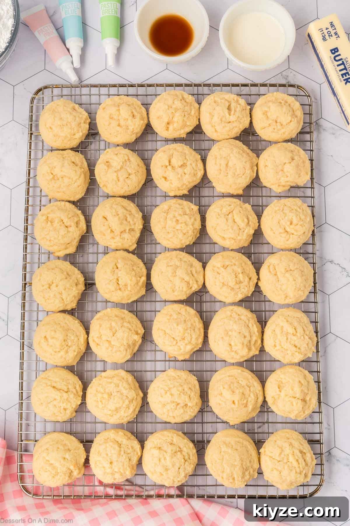 Sour Cream Sugar Cookies Recipe for Soft, Tender Cookies 11 Sour Cream Sugar Cookies cooling on a wire rack.