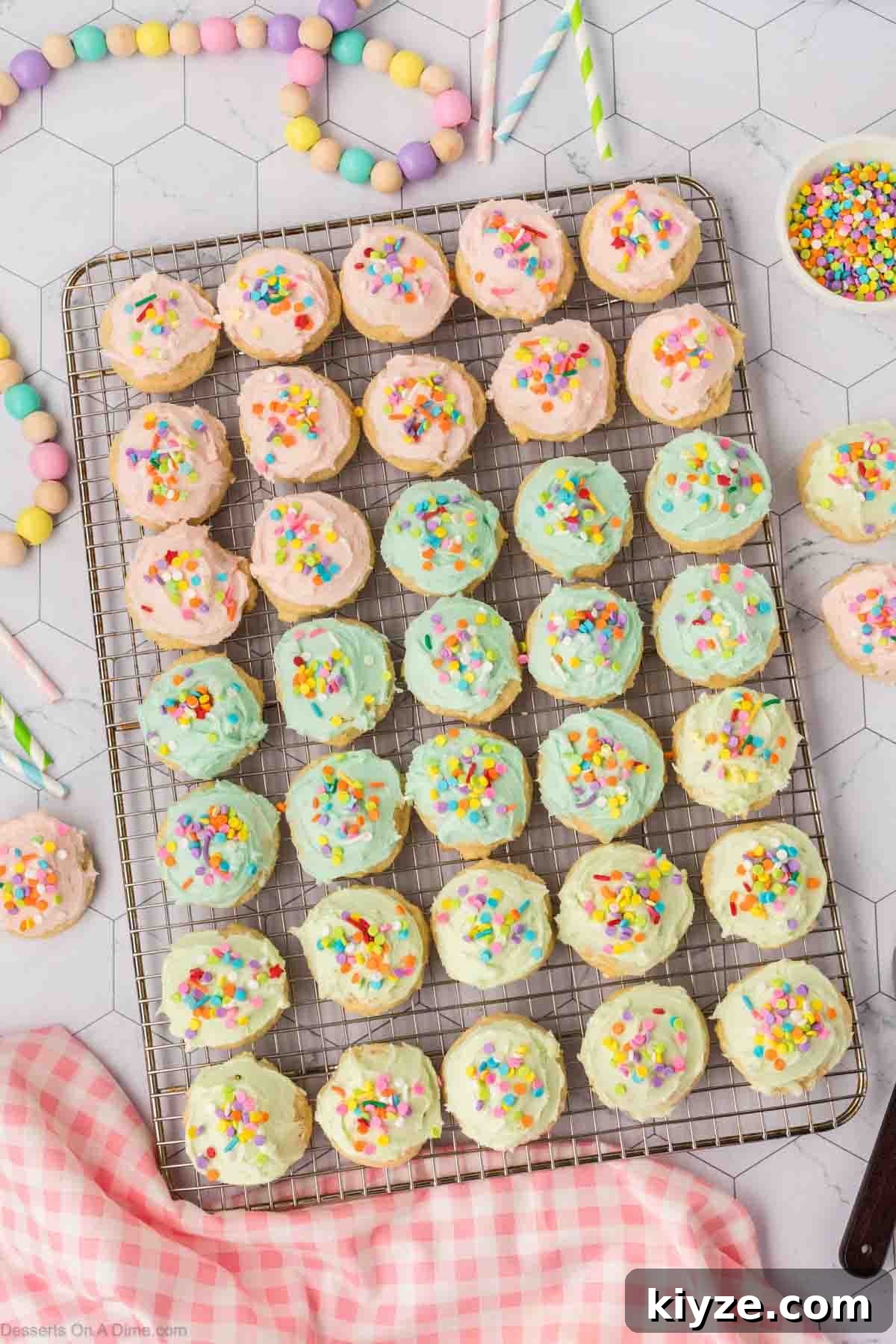 Sour Cream Sugar Cookies Recipe for Soft, Tender Cookies 14 Sugar Cookies with frosting and sprinkles.