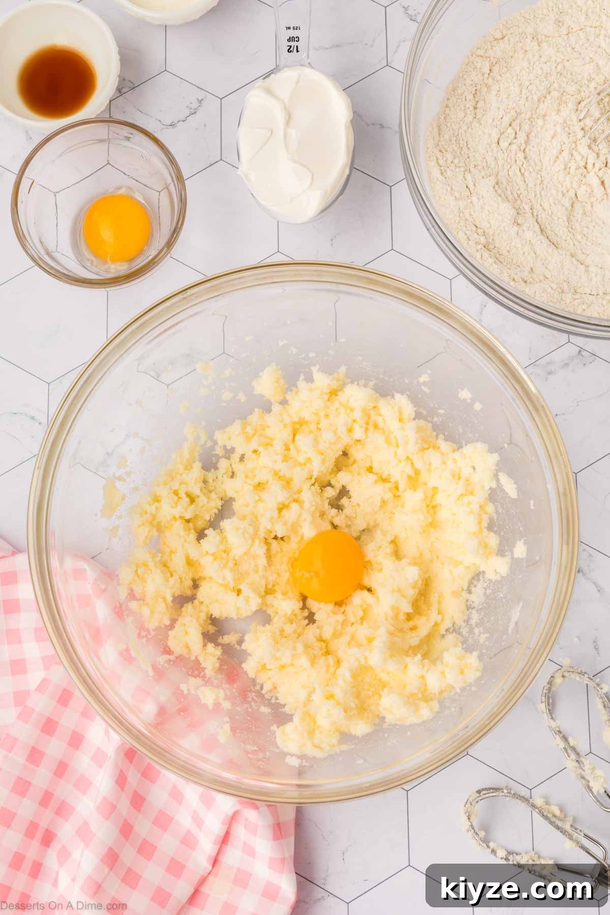 Sour Cream Sugar Cookies Recipe for Soft, Tender Cookies 5 Eggs and butter combined in a bowl.