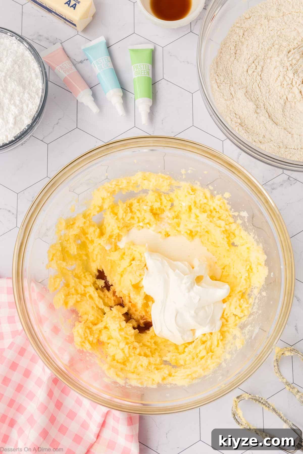 Sour Cream Sugar Cookies Recipe for Soft, Tender Cookies 6 Sour cream, vanilla and heavy cream added to the bowl.