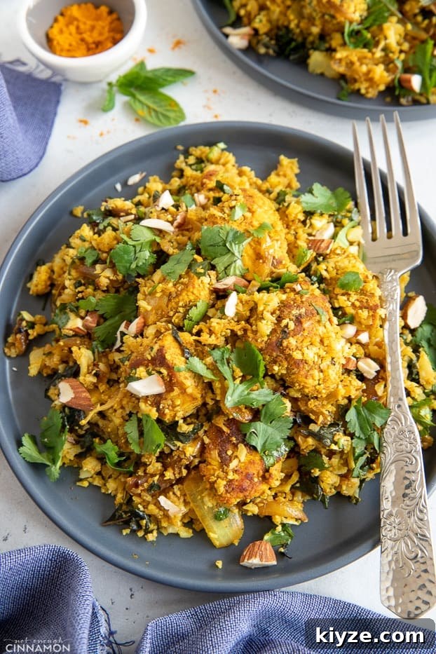 cauliflower rice stir-fry overhead shot of a plate with healthy paleo chicken biryani cauliflower rice stir-fry