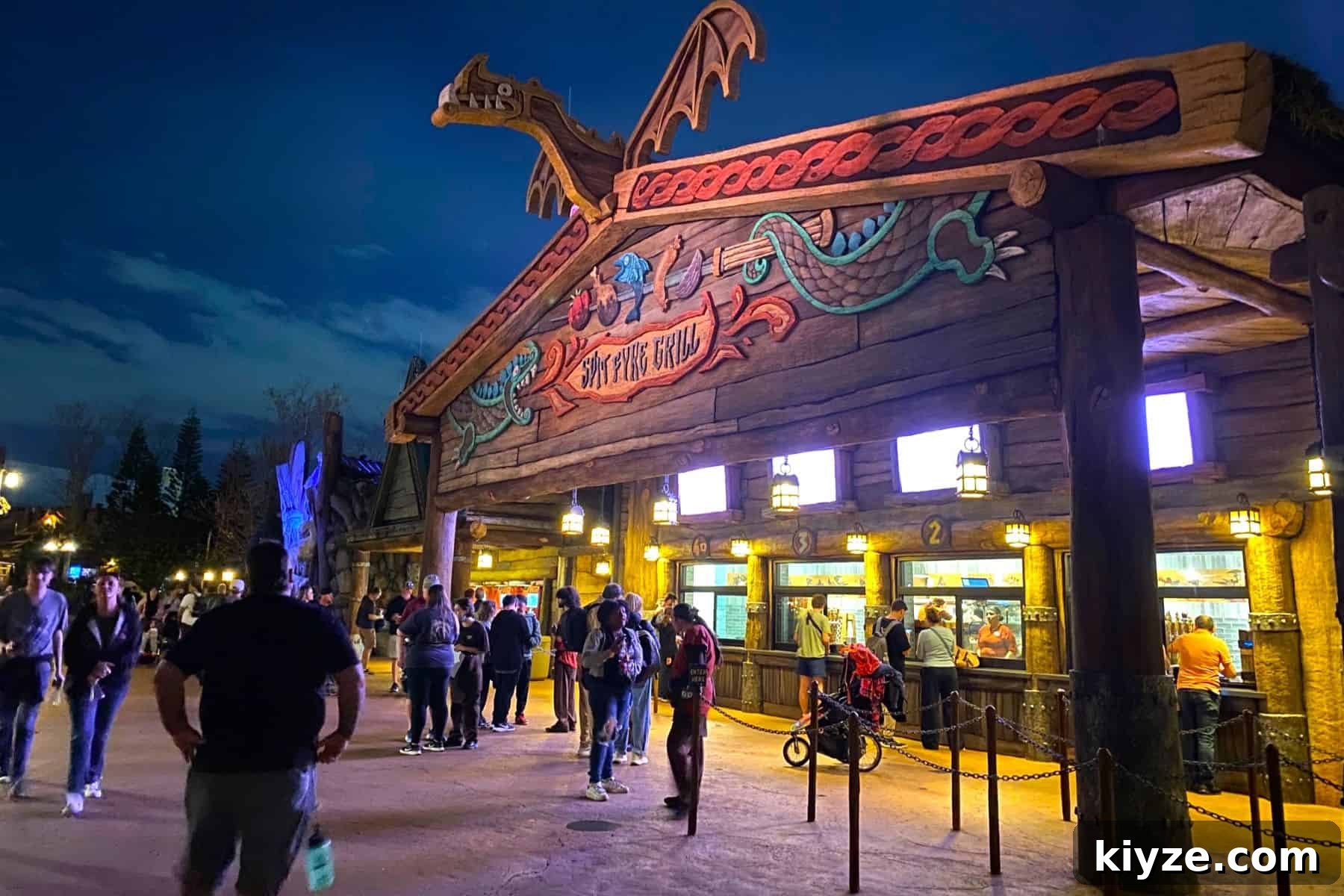 Spit Fyre Grill Review: Menu, Rides & Tips for Epic Universe 3 epic universe spit fyre grill exterior