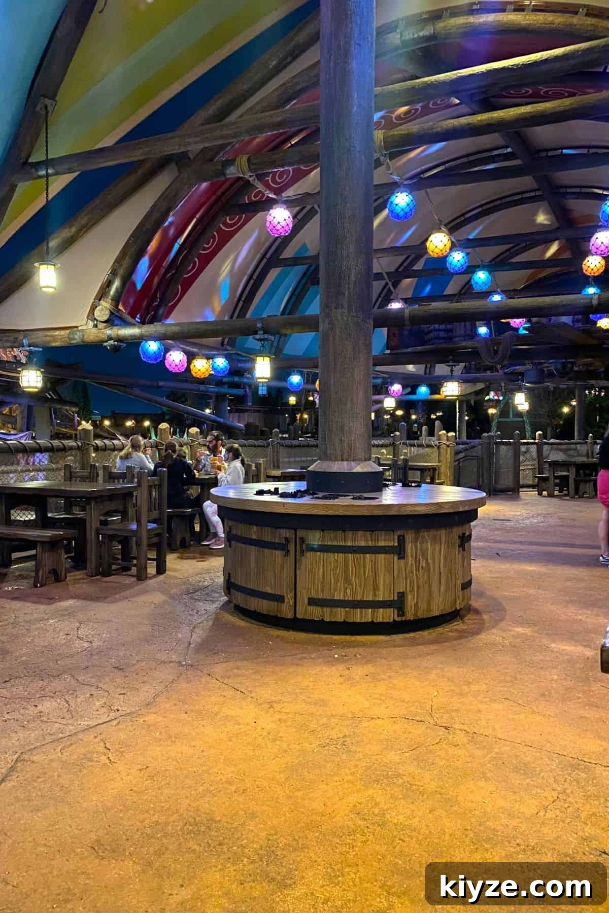Spit Fyre Grill Review: Menu, Rides & Tips for Epic Universe 4 epic universe spit fyre grill seating area