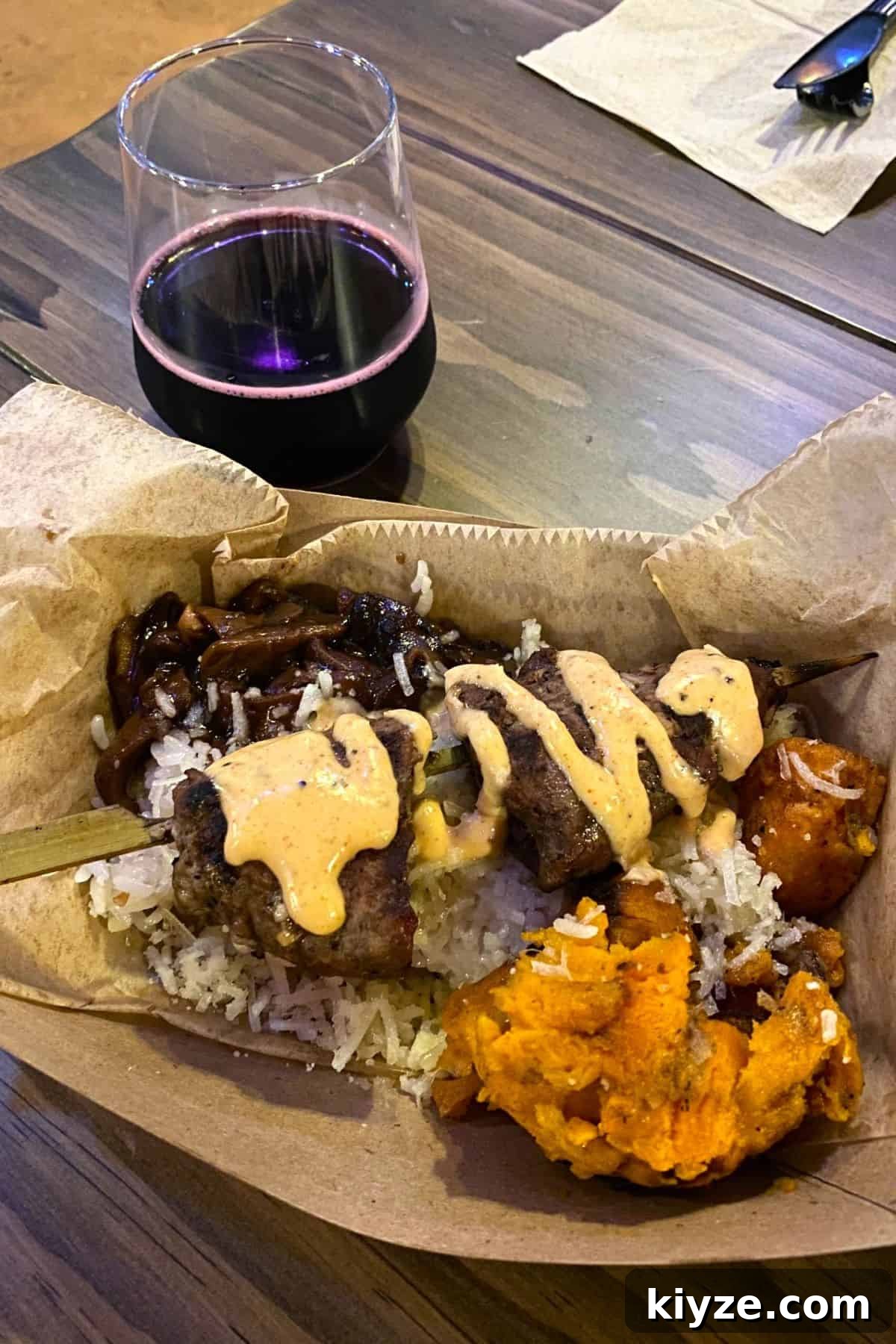 Spit Fyre Grill Review: Menu, Rides & Tips for Epic Universe 7 Stoick's Steak Bowl spit fyre grill epic universe