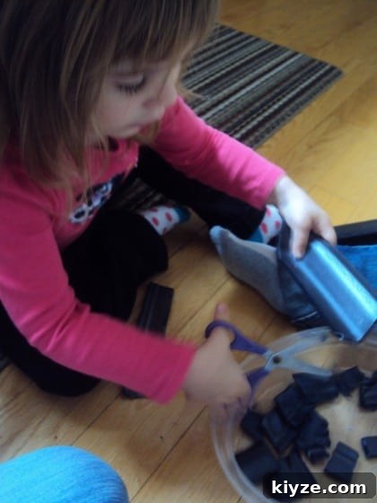 Spider and Web Craft Activities to Boost Preschool Fine Motor Skills 8 toddlers cutting styrofoam