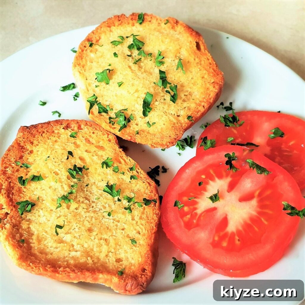 A crusty Portuguese rolls covered with garlic butter and toasted until brown and crispy. A crusty Portuguese rolls covered with garlic butter and toasted until brown and crispy.