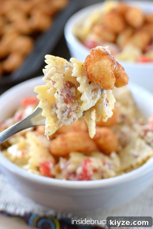 Bacon Shrimp Alfredo Pasta photo with fork Easy homemade Alfredo sauce that can be made in minutes. Bacon, red peppers, and popcorn shrimp make this pasta taste amazing!
