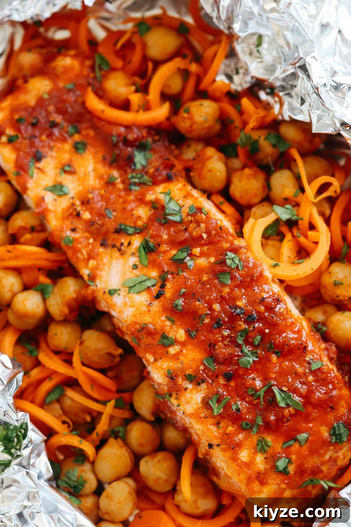 Moroccan Salmon Foil Packets with Carrot Noodles & Chickpeas 4 These Moroccan Salmon Foil Packets with Carrot Noodles & Chickpeas are sweet and spicy with tons of flavor and are easily made in just 20 minutes with little to no clean-up!