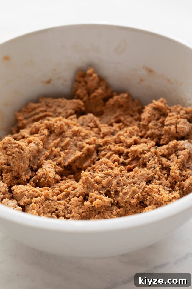 Vegan breakfast sausage made with textured vegetable protein, flour, vegetable stock and tons of herbs and spices. It tastes like the real thing! #vegan #glutenfree #breakfast #simpleveganblog Vegan Breakfast Sausage