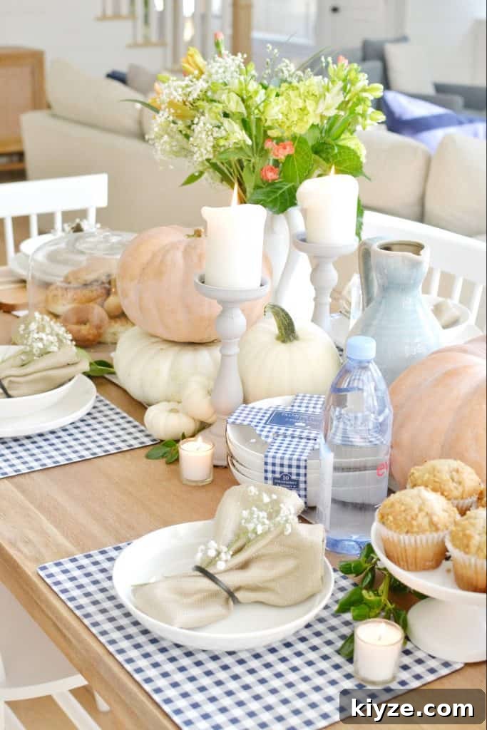 Fall Tablescape Ideas You Can Recreate at Home 5 a closeup shot of a pumpkin tablescape with fall decor
