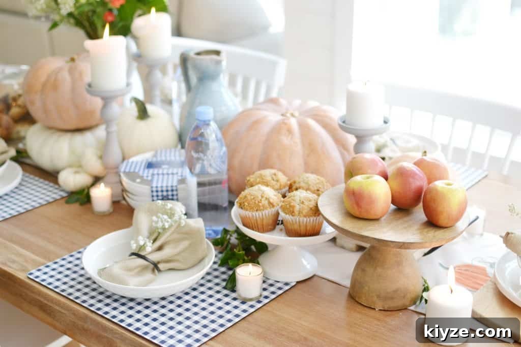 Fall Tablescape Ideas You Can Recreate at Home 6 pumpkins and fall decor on a table for fall entertaining