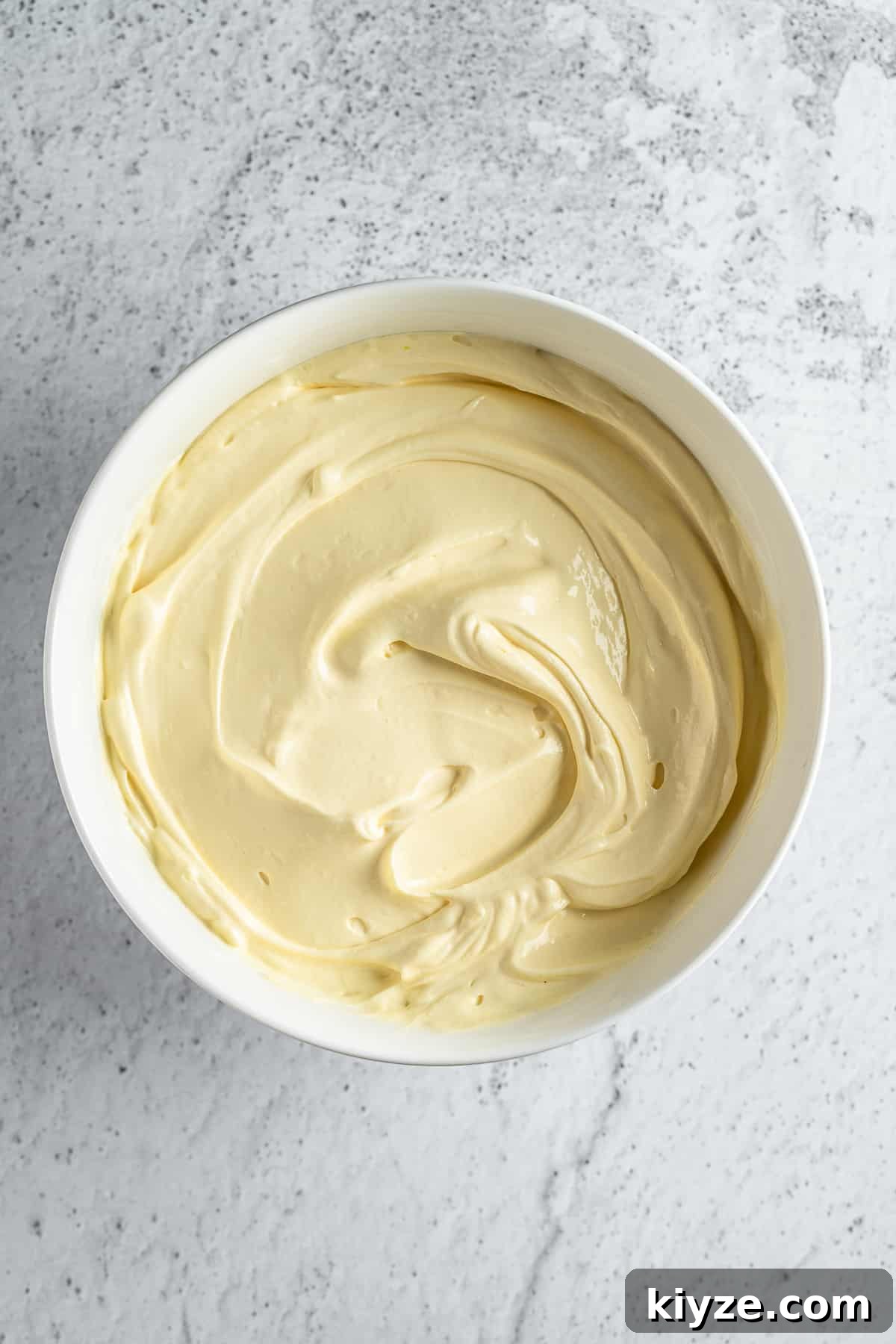 Classic Tiramisu with Marsala and Mascarpone Recipe 5 Mascarpone cream in a bowl.