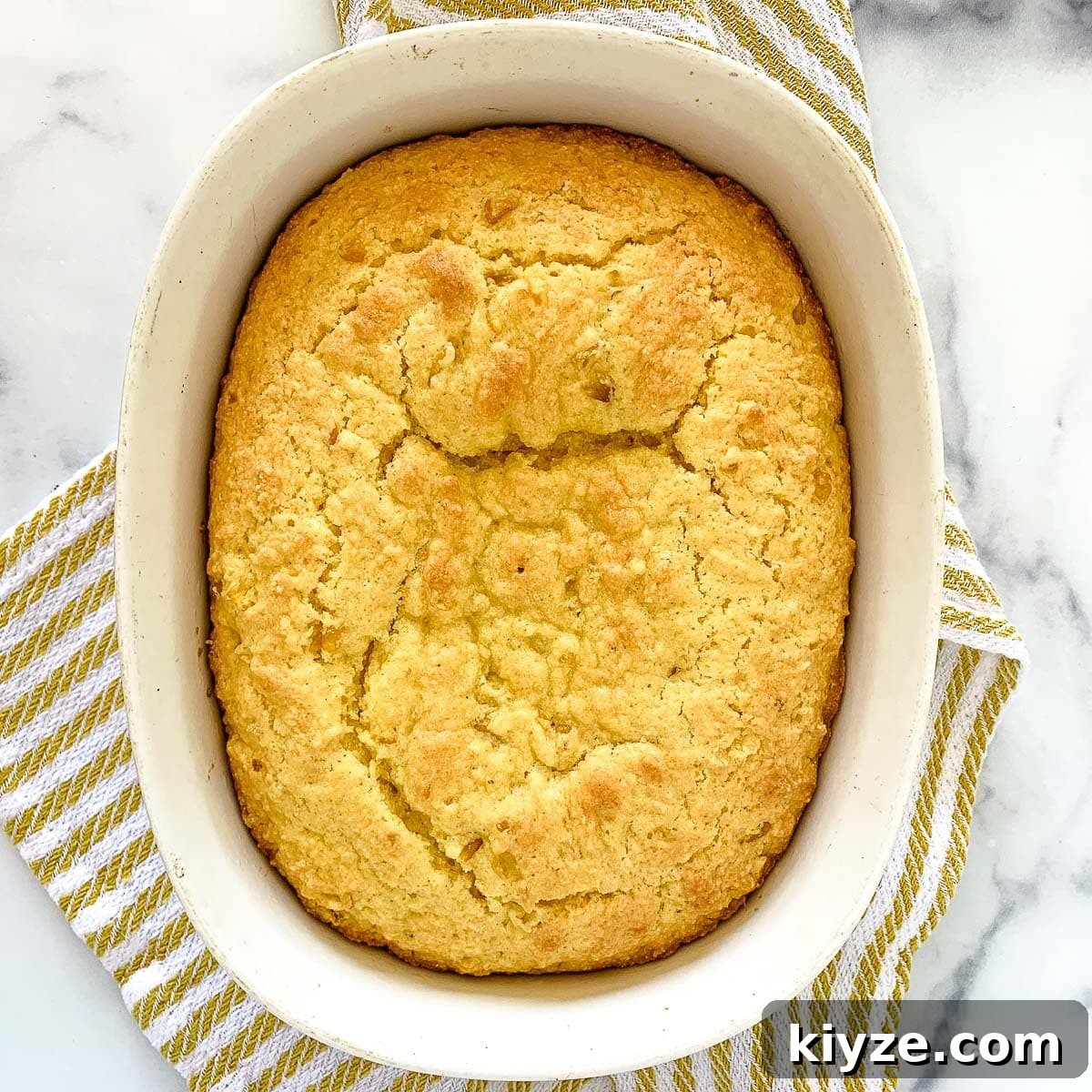 Jiffy Cornbread with Creamed Corn Casserole Recipe 9 a casserole with Jiffy cornbread with creamed corn.