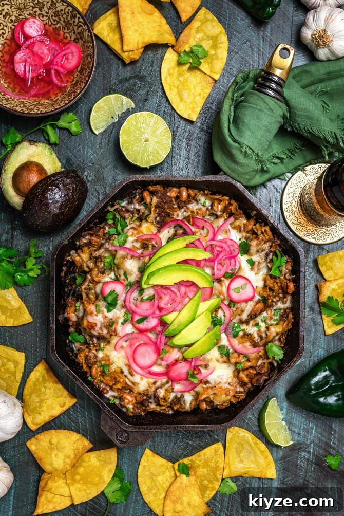 One-Pan Cheesy Enchilada Skillet Recipe 5 Easy Enchilada Skillet plated with cilantro and avocado