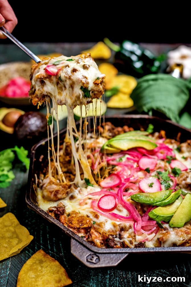 One-Pan Cheesy Enchilada Skillet Recipe 6 Skillet of enchilada-style casserole topped with pickled onions