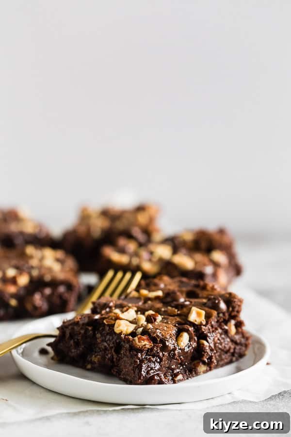 Hazelnut Buckwheat Brownies Recipe with Crispy Edges 5 Hazelnut Buckwheat Brownies on serving plates.