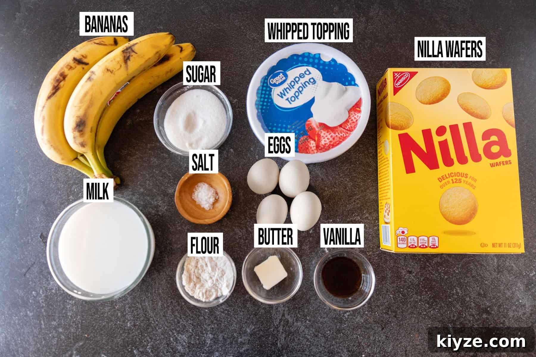 Banana Pudding Ingredients laid out in individual bowls and labeled.