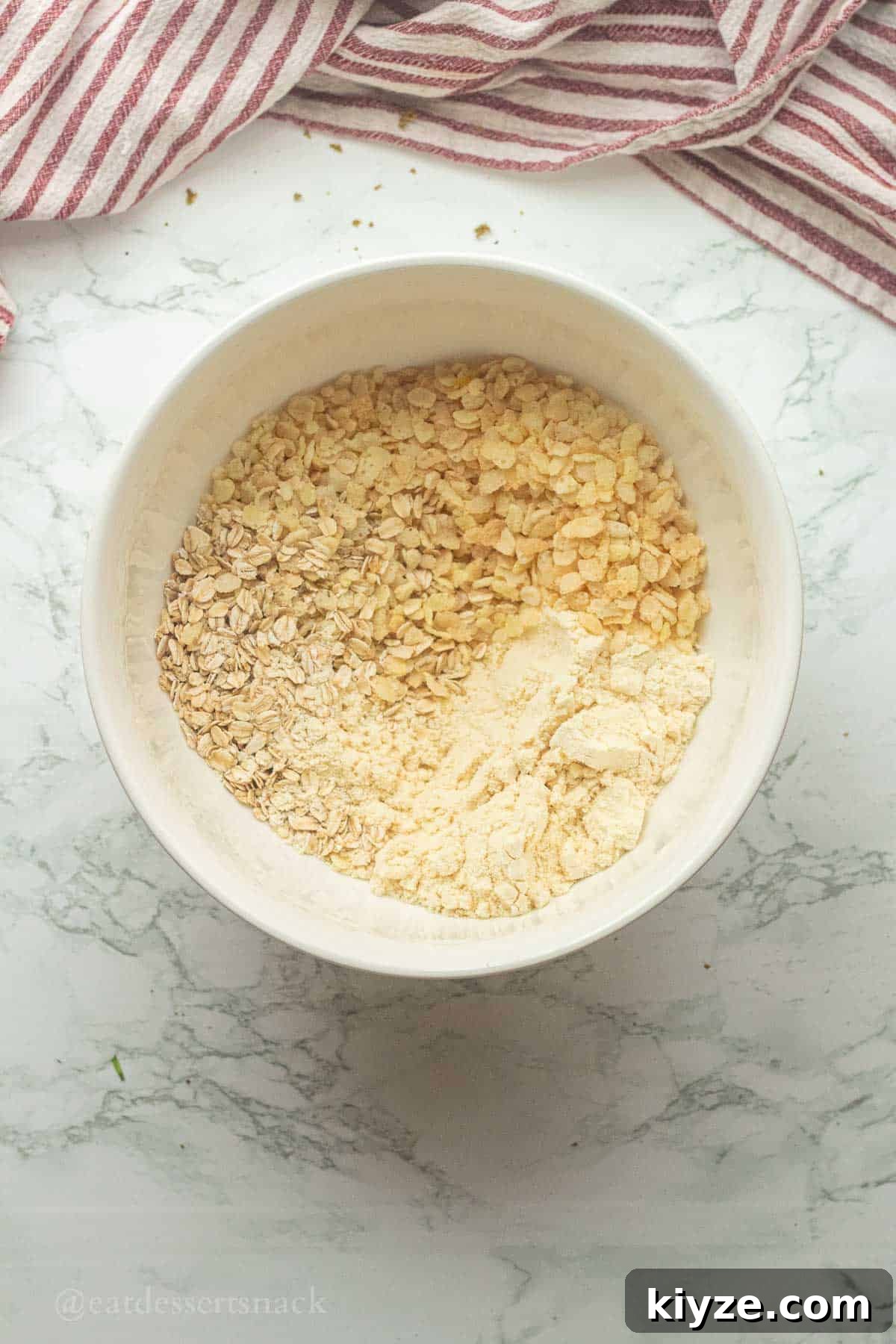 Dry ingredients for protein balls in bowl.