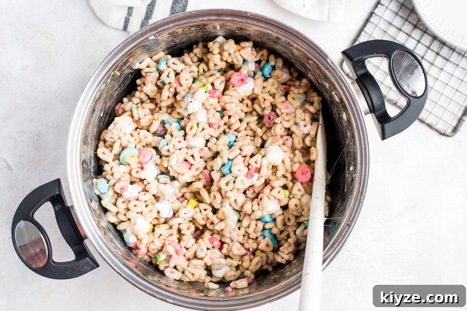 Lucky Charms Treats Recipe: Crispy Marshmallow Snack Bars 5 ingredients for bars mixed together