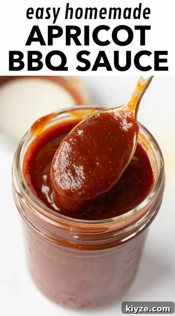 20-Minute Apricot Barbecue Sauce with Sweet and Tangy Flavor 8 pin for for apricot bbq sauce with those words written in black on the top and a picture of the bbq sauce in a small mason jar with a spoon digging some out of it.