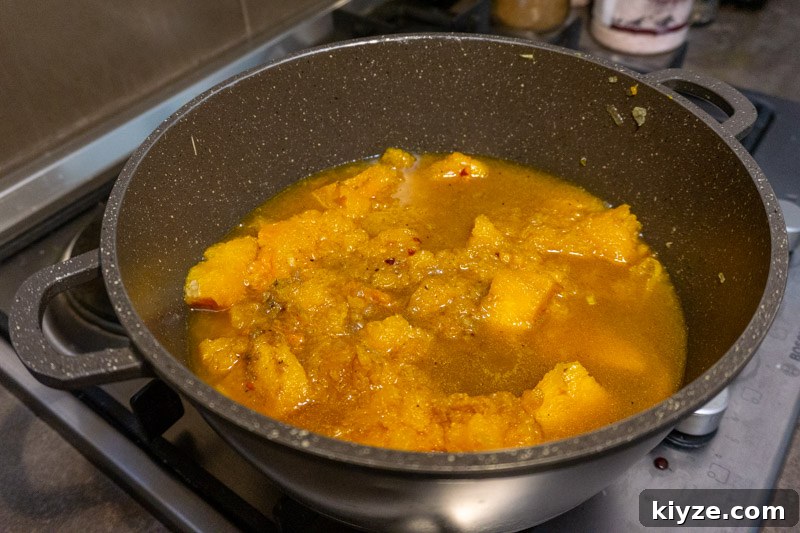 Creamy Pumpkin Soup from Scratch — No Stock or Blender Needed 6 Adding in your roast pumpkin