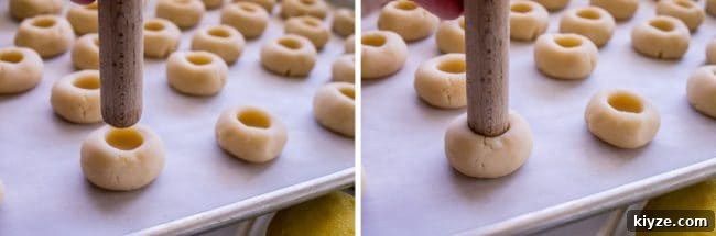 Almond Raspberry Thumbprint Cookies: Chewy Jam-Filled Recipe 8 Using spatula end to make thumbprints in dough balls.
