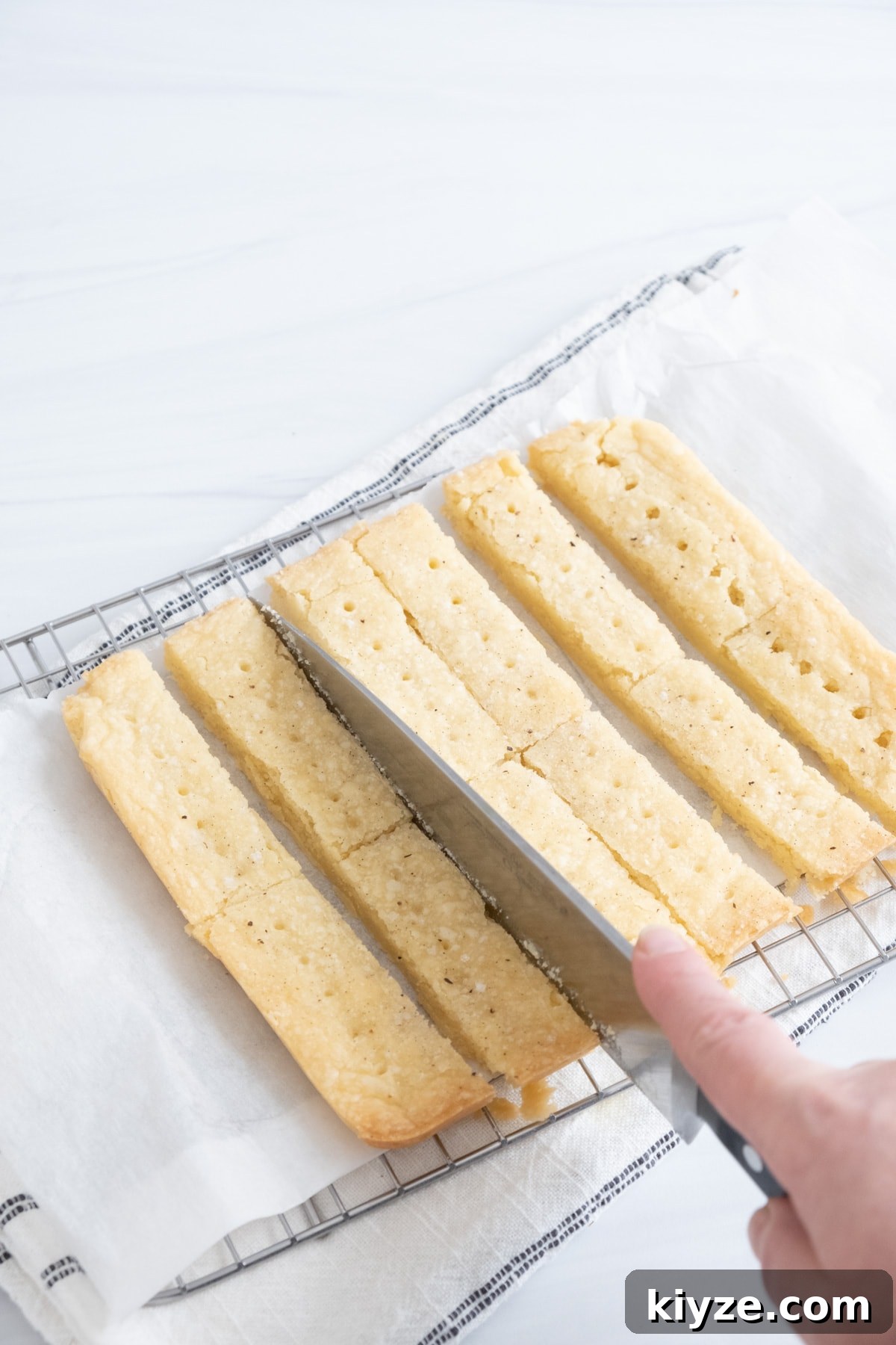 Traditional Scottish Shortbread Cookies Recipe — Buttery & Crisp 22 separate cut pieces with knife