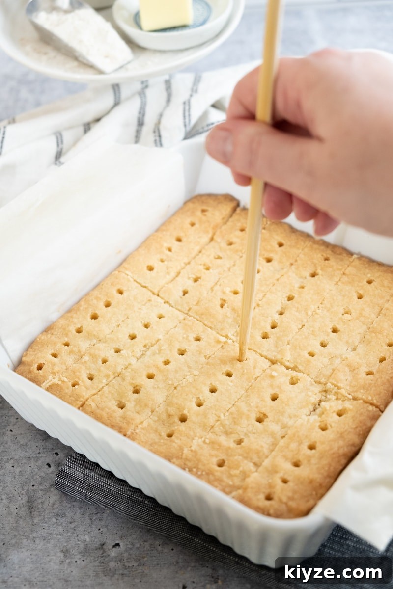 Traditional Scottish Shortbread Cookies Recipe — Buttery & Crisp 24 redefining the holes with a chopstick