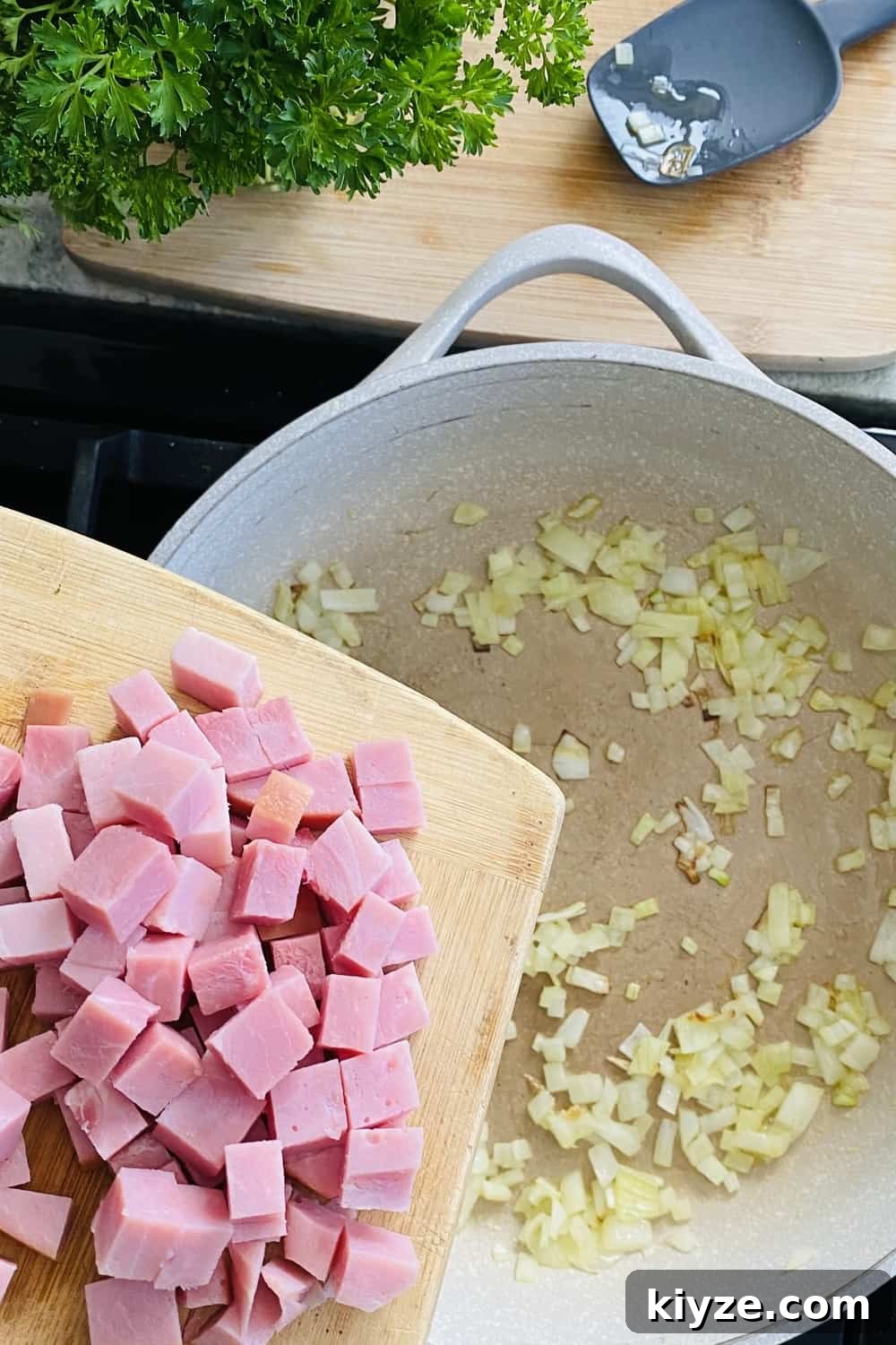 adding ham to a sauté pan