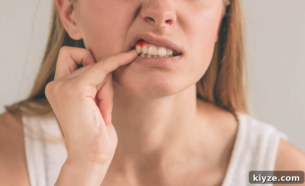 DIY Natural Oil Blend for Toothache Pain Relief 3 Gum and toothache image.