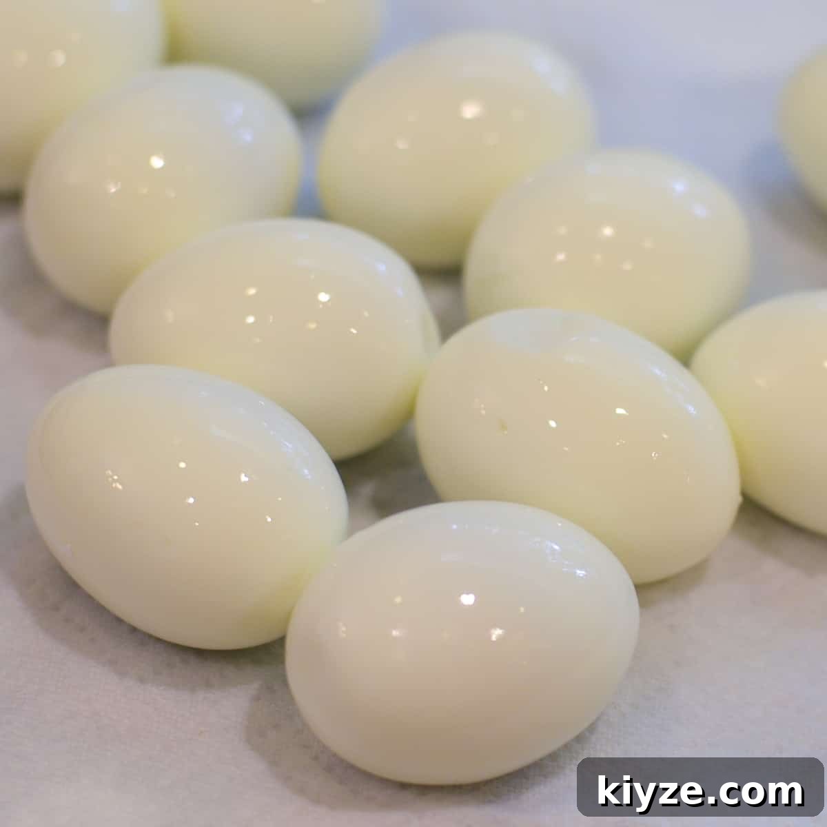 How to Make Hard-Boiled Eggs That Peel Perfectly 10 Peeled hard boiled eggs on paper towels.