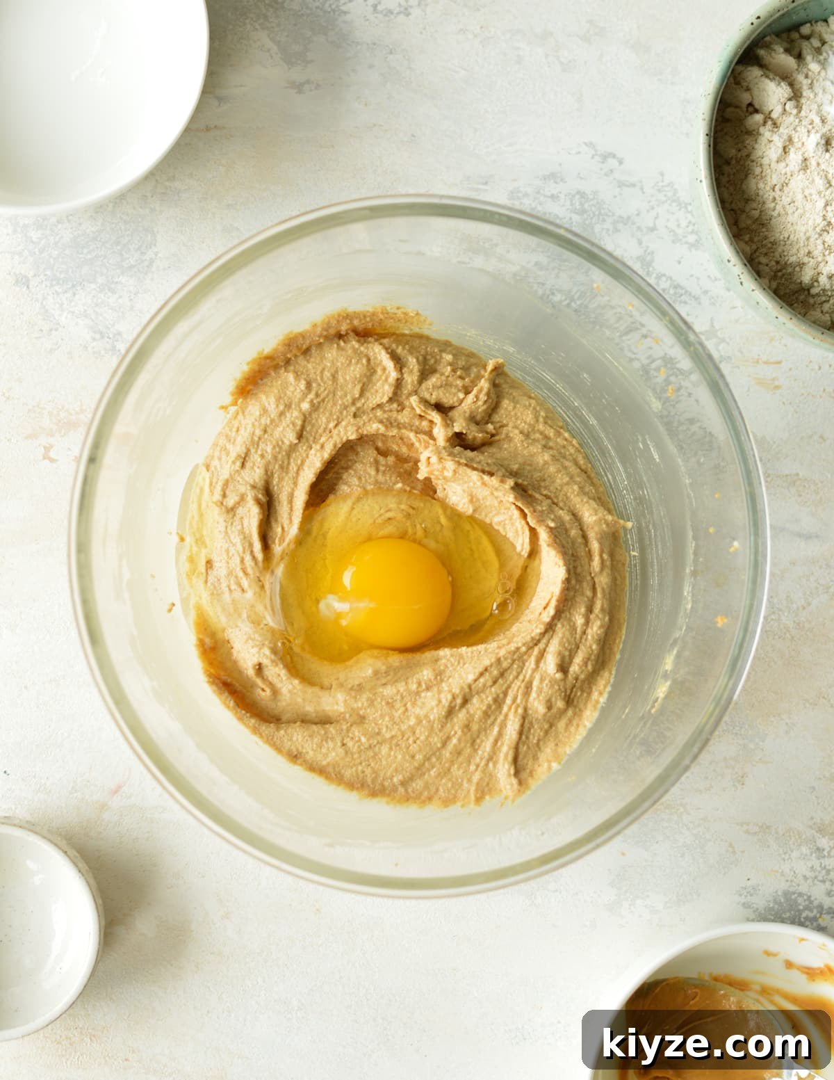 Chewy Peanut Butter Cookies Made with Oat Flour 6 creamed butter and peanut butter with an egg on top.