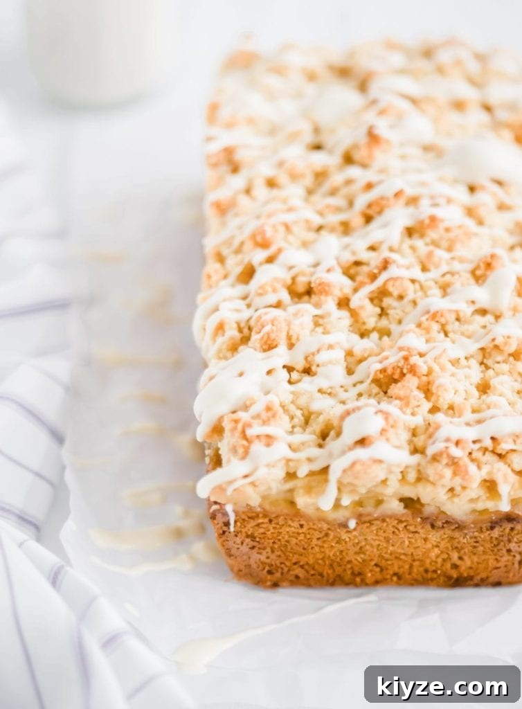 the best ever dairy free apple cinnamon crumb coffee cake recipe with milk in background