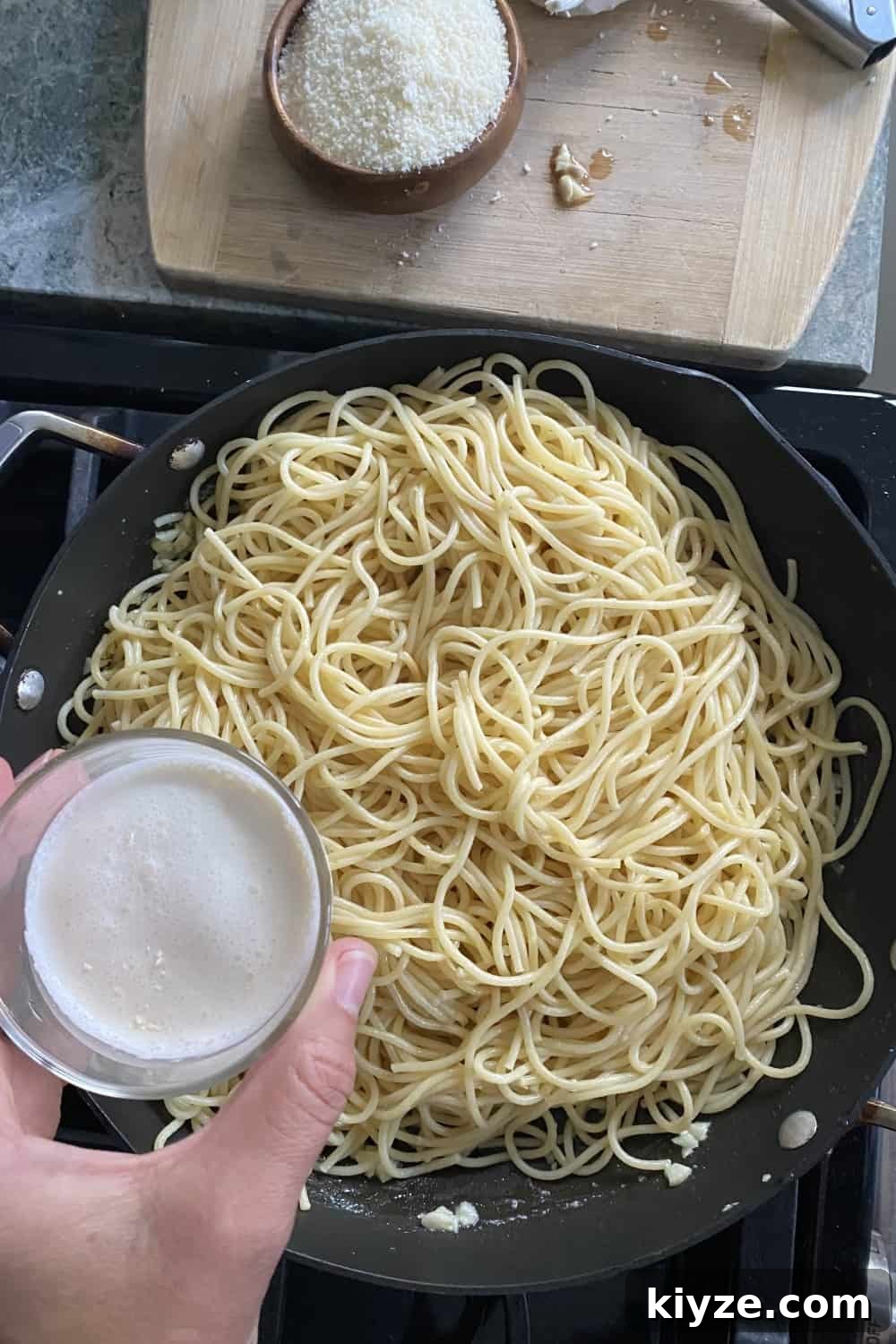 Parmesan Garlic Butter Noodles Recipe 7 adding heavy cream to noodles
