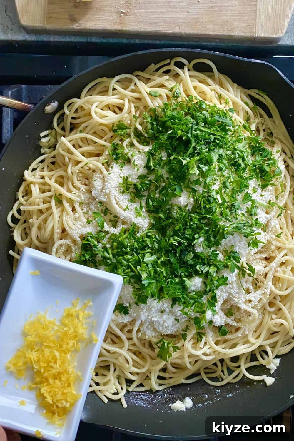 Parmesan Garlic Butter Noodles Recipe 8 adding lemon zest to buttered noodles with Parmesan