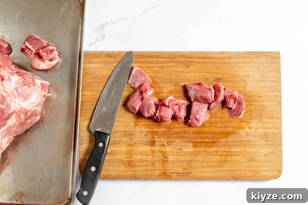 How to Can Venison Safely: Step-by-Step Guide for Beginners 5 cutting pork roast into cubes for canning
