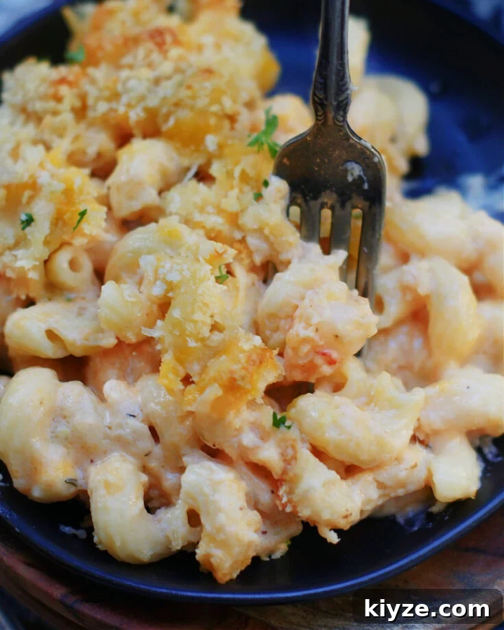 Baked macaroni and cheese with 2 cheese, shrimp and crab makes a creamy one dish meal or holiday side dish!