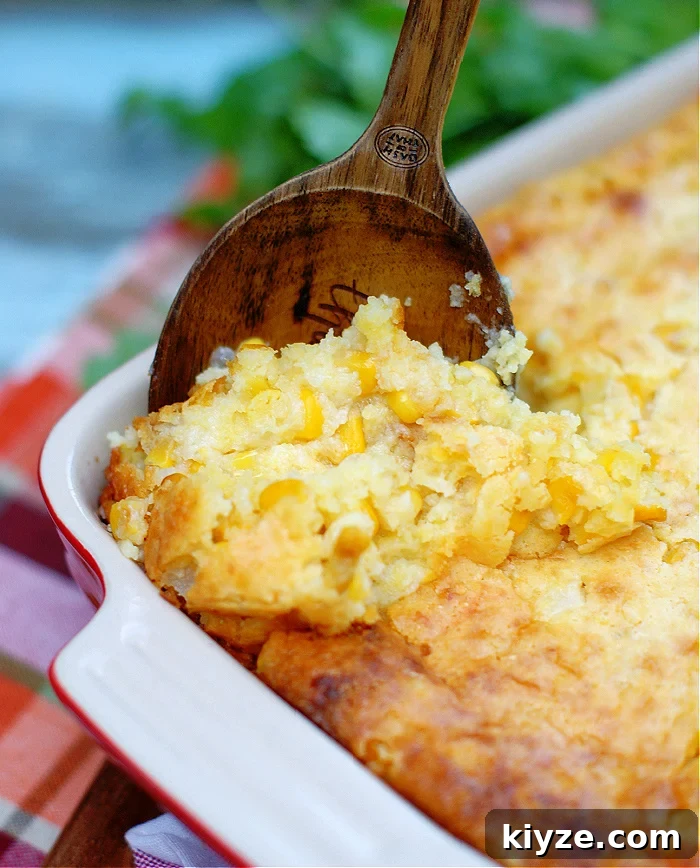 A spoonful of cornbread pudding, or corn casserole.