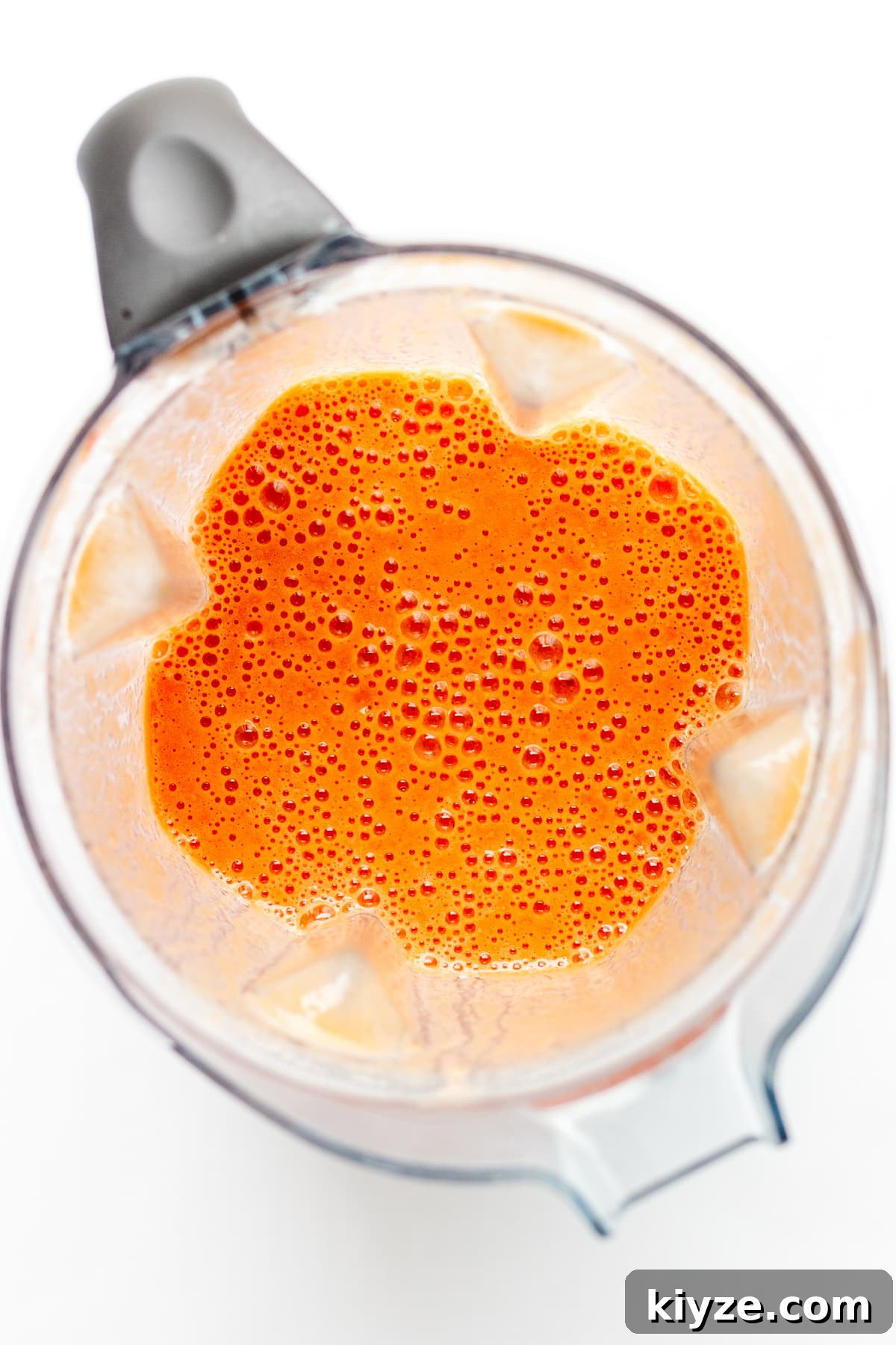 High-Vitamin C Immunity-Boost Smoothie Recipe 6 Overhead photo of open blender containing smoothie.
